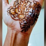 Create beautiful mehndi designs on your hands to welcome Bappa