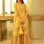 Wear such sharara suits on turmeric