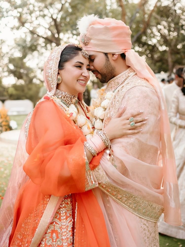 Aashna Shroff becomes Armaan Malik's bride in orange lehenga