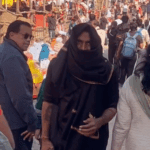 Maha kumbh Prayagraj bollywood actor remo dsouza covering his face with black cloth VIDEO | Remo D’Souza reached Mahakumbh by covering his face with black cloth: Took a dip in Sangam, took a boat ride; Took blessings of Swami Kailashanand with his wife